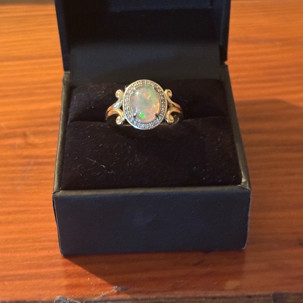 Elegant Opal Ring with Gold Accents